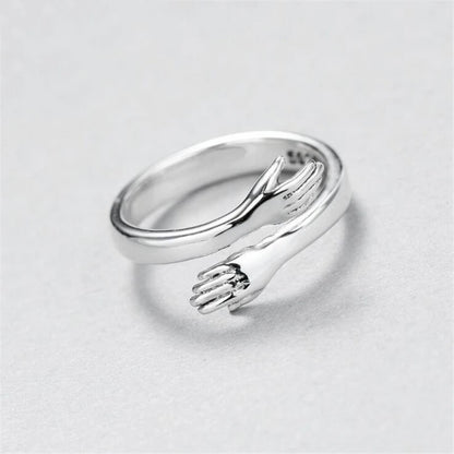 Romantic Love Hug Hand Ring – Elegant Men's Accessory | Accessorio Uomo Elegante