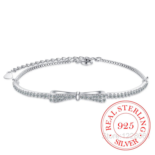DRAVEN — 925 Sterling Silver Bowknot Tennis Bracelet — Bracelets | DRAVEN