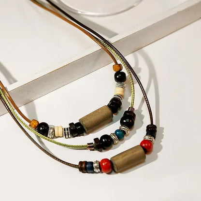 Layered Leather Rope Necklace – Vintage Wood Pendant Jewelry for Men – Elegant Men's Accessory | Accessorio Uomo Elegante