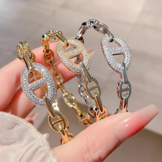 DRAVEN — 18K Gold Plated Skeleton Bangle — Prodotti