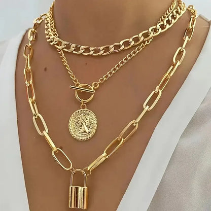 3PCS Layered Gold Necklace Set – Vintage Embossed Round & Lock Pendants